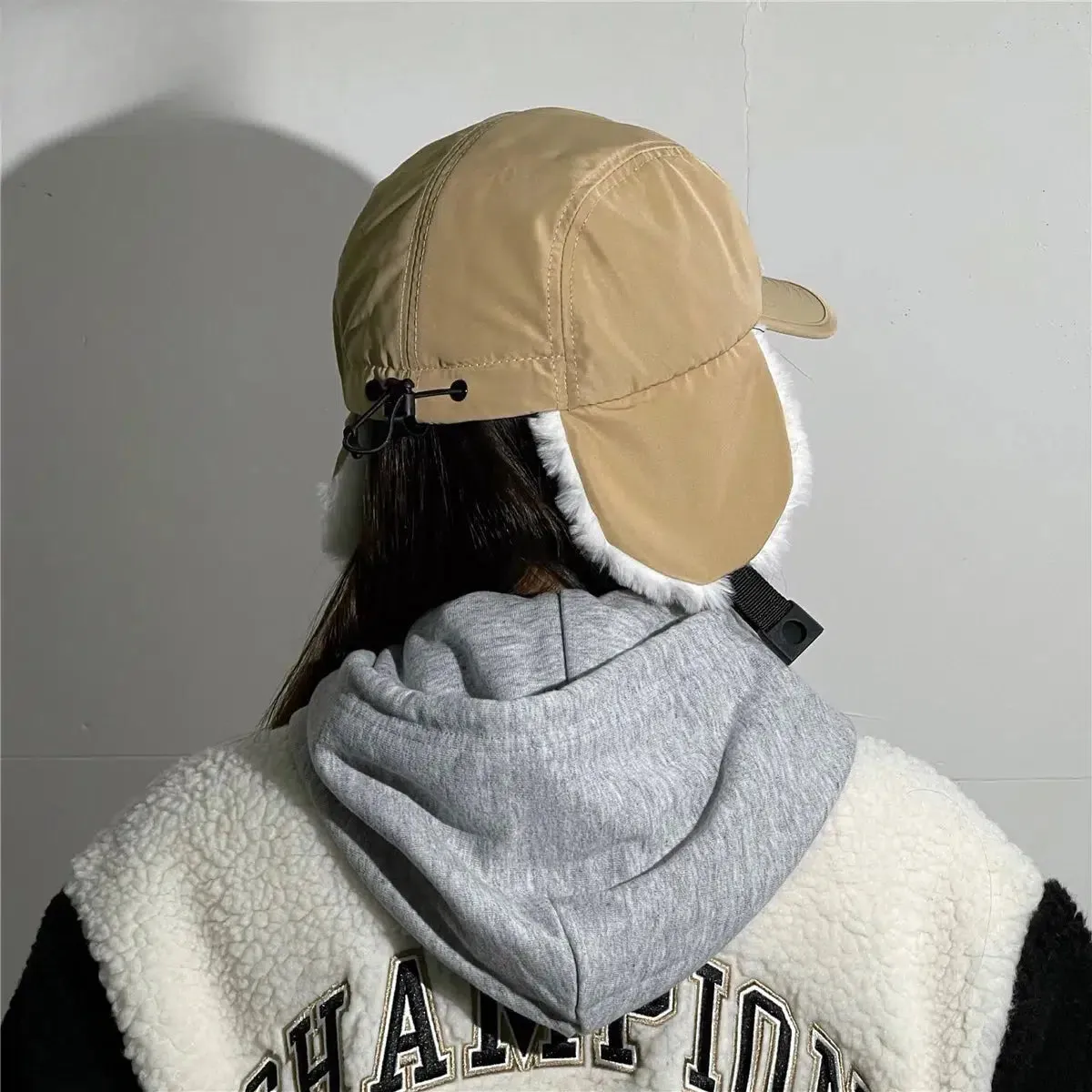 Cyrina – Windproof earflap – Cap