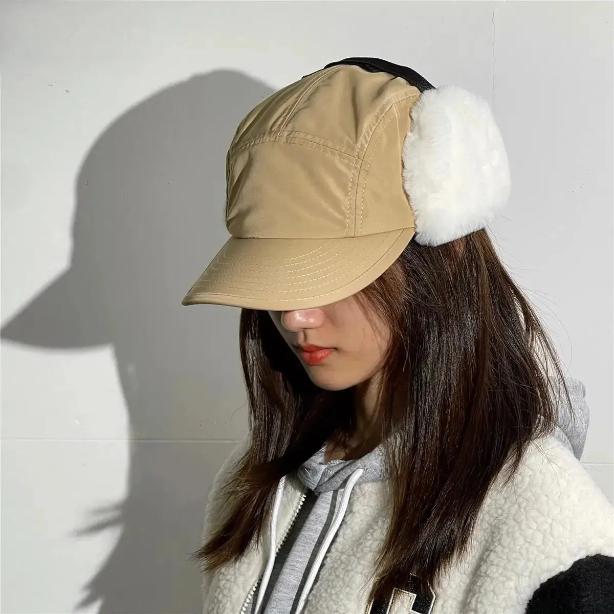 Cyrina – Windproof earflap – Cap